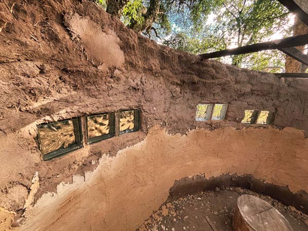 Inside Celtic sweat house surrounded by oaks